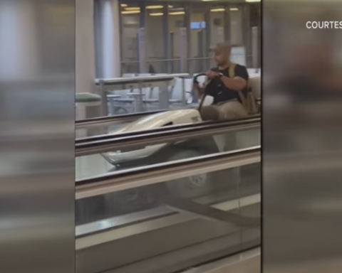 Wyoming man driving golf cart in airport terminal